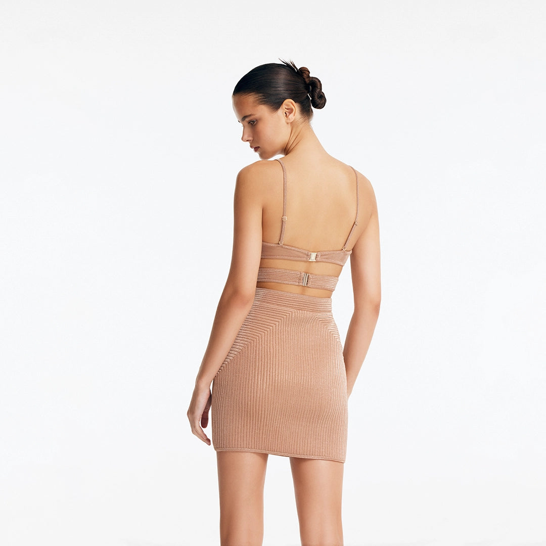 Rye Bronze Fitted Mini Skirt with Topstitching Details | Moeva | Skirt | Each week unveils new pieces—luxury swimwear, fluid resort silhouettes, and elevated summer-to-evening essentials designed to carry you from coastal escapes to city nights.