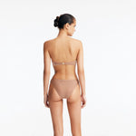 Nixie Bronze Bandeau Mid Coverage Bikini Set | Moeva | Bikini Set | Each week unveils new pieces—luxury swimwear, fluid resort silhouettes, and elevated summer-to-evening essentials designed to carry you from coastal escapes to city nights.