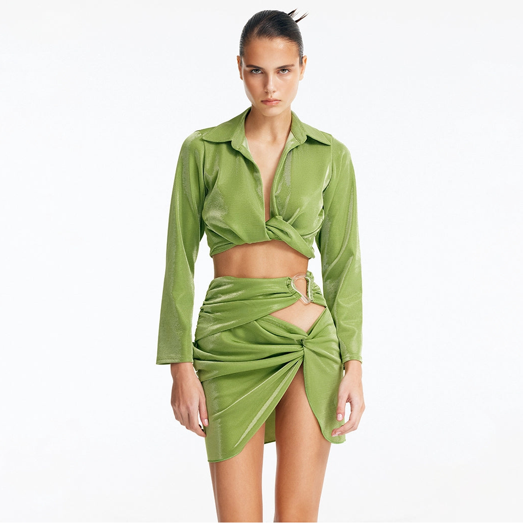Greta Green Long Sleeve Tie Front Shirt and Indigo Asymmetric Ring-Drape Mini Skirt | Moeva | Set | Each week unveils new pieces—luxury swimwear, fluid resort silhouettes, and elevated summer-to-evening essentials designed to carry you from coastal escapes to city nights.