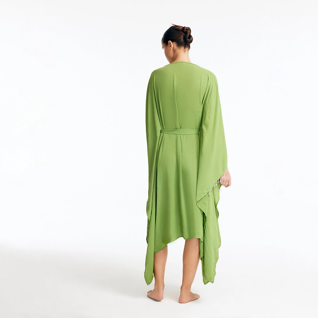Bethany Green V Neck Belted Silk Kaftan | Moeva | Kaftan | Each week unveils new pieces—luxury swimwear, fluid resort silhouettes, and elevated summer-to-evening essentials designed to carry you from coastal escapes to city nights.