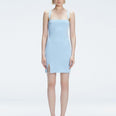 Front view of model wearing Heather Baby Blue Mini Dress with square neckline, adjustable straps, and front slit.
