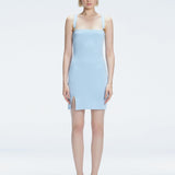 Front view of model wearing Heather Baby Blue Mini Dress with square neckline, adjustable straps, and front slit.
