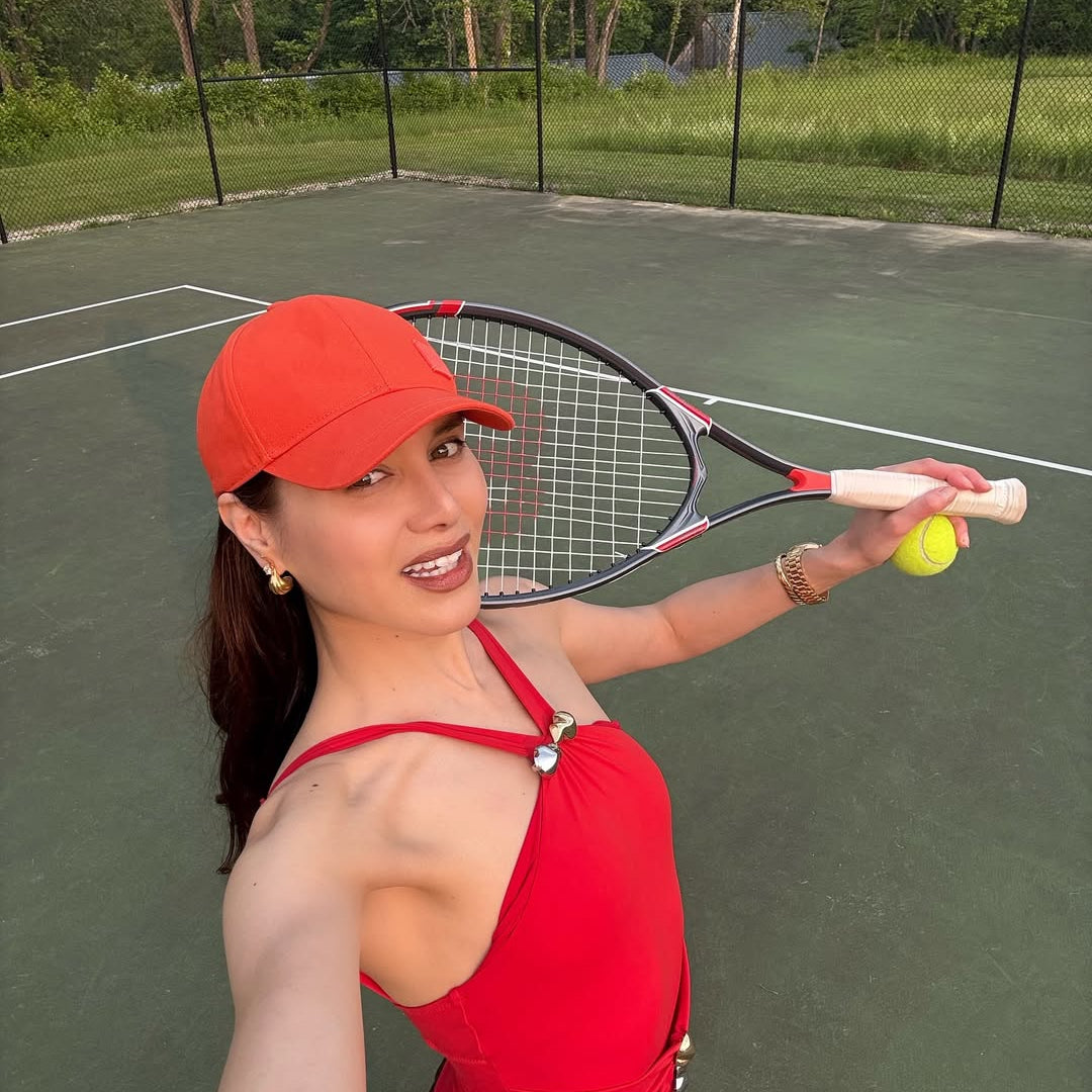 Natalie Lim Suarez - Lyra Red Halter Swimsuit | Moeva | Swimsuit | Each week unveils new pieces—luxury swimwear, fluid resort silhouettes, and elevated summer-to-evening essentials designed to carry you from coastal escapes to city nights.