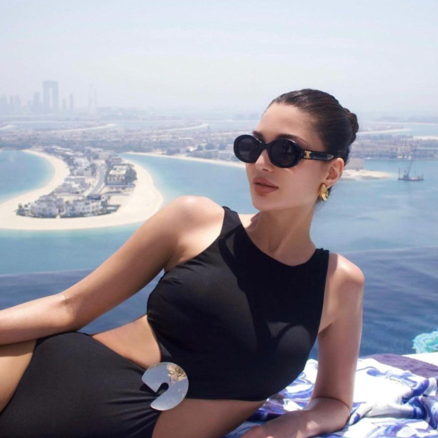 Alice Abdel Aziz - Honora Black High Neck Swimsuit | Moeva | Swimsuit | Each week unveils new pieces—luxury swimwear, fluid resort silhouettes, and elevated summer-to-evening essentials designed to carry you from coastal escapes to city nights.