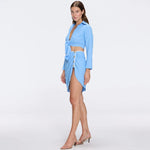 Mirazur Gold Buttoned High-Waist Mini Blue Skirt | Moeva | Beachwear Skirts | Each week unveils new pieces—luxury swimwear, fluid resort silhouettes, and elevated summer-to-evening essentials designed to carry you from coastal escapes to city nights.