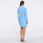 Mirazur Gold Buttoned High-Waist Mini Blue Skirt | Moeva | Beachwear Skirts | Each week unveils new pieces—luxury swimwear, fluid resort silhouettes, and elevated summer-to-evening essentials designed to carry you from coastal escapes to city nights.