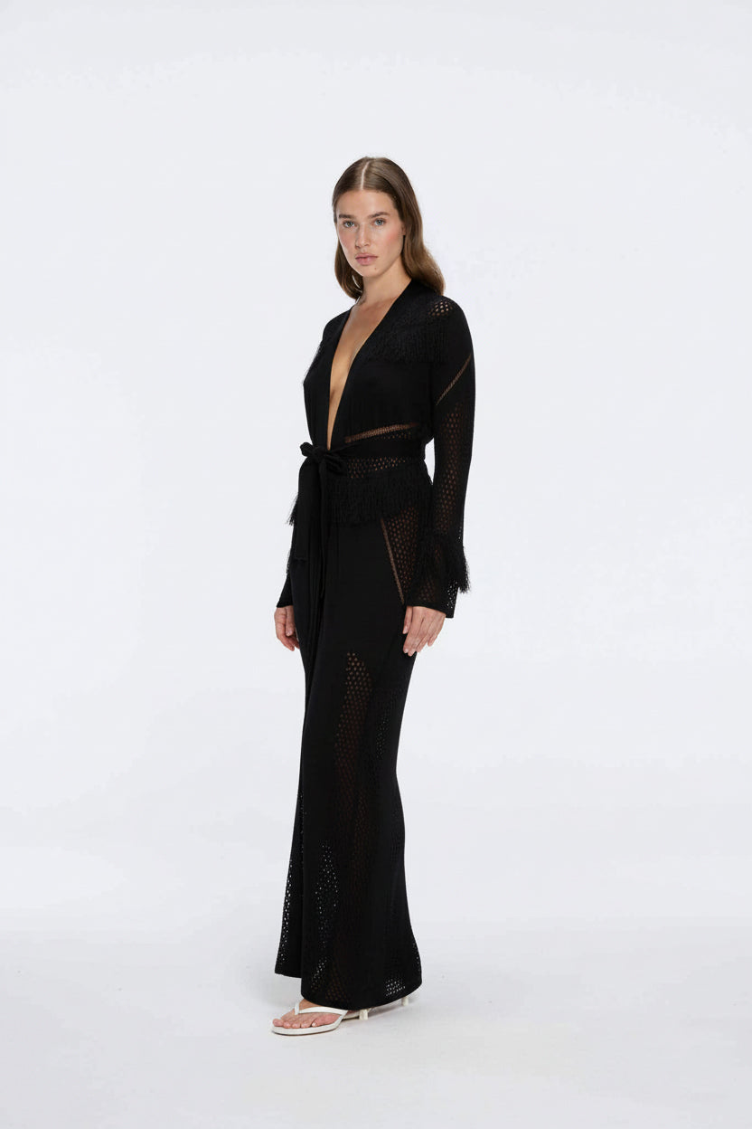 Itzel Black Knitted Mesh Long-Sleeve Kaftan | Moeva | Kaftans | Each week unveils new pieces—luxury swimwear, fluid resort silhouettes, and elevated summer-to-evening essentials designed to carry you from coastal escapes to city nights.