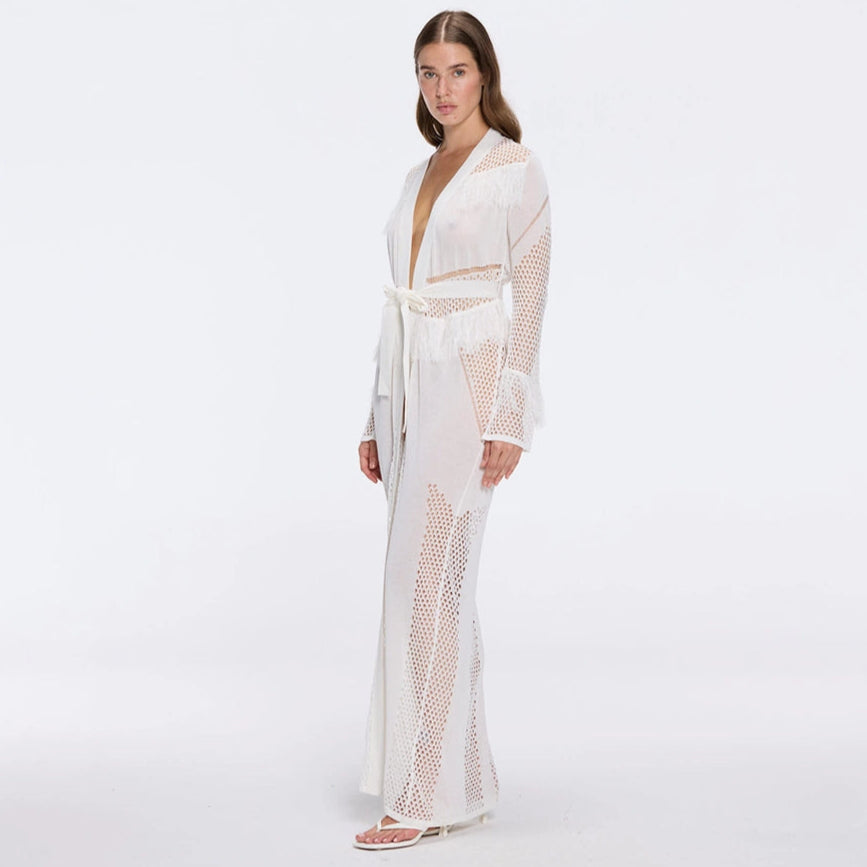 Itzel White Knitted Mesh Long-Sleeve Kaftan | Moeva | Kaftan | Each week unveils new pieces—luxury swimwear, fluid resort silhouettes, and elevated summer-to-evening essentials designed to carry you from coastal escapes to city nights.