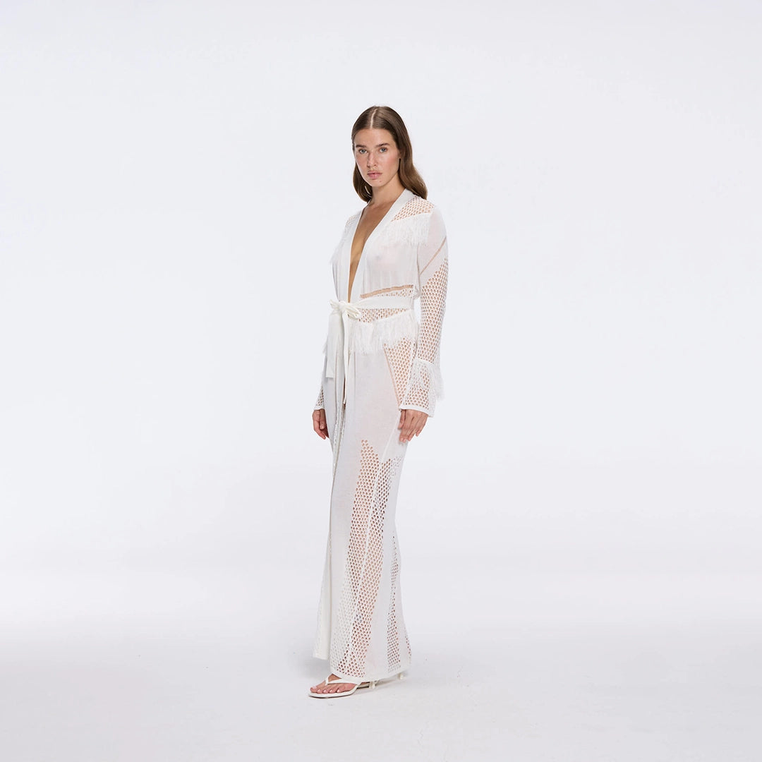 Itzel White Knitted Mesh Long-Sleeve Kaftan | Moeva | Kaftans | Each week unveils new pieces—luxury swimwear, fluid resort silhouettes, and elevated summer-to-evening essentials designed to carry you from coastal escapes to city nights.