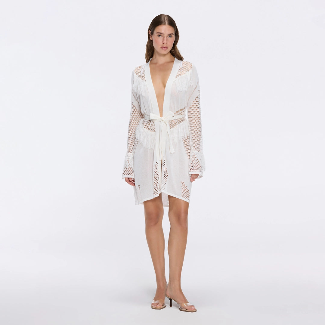 Kenga Knitted Knee-Length Long-Sleeve Belted White Kaftan | Moeva | Kaftan | Each week unveils new pieces—luxury swimwear, fluid resort silhouettes, and elevated summer-to-evening essentials designed to carry you from coastal escapes to city nights.