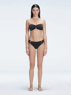 "Model wearing the Ilana Black Bikini Top from the front, showcasing the chic bandeau style and elegant buckle detail."

