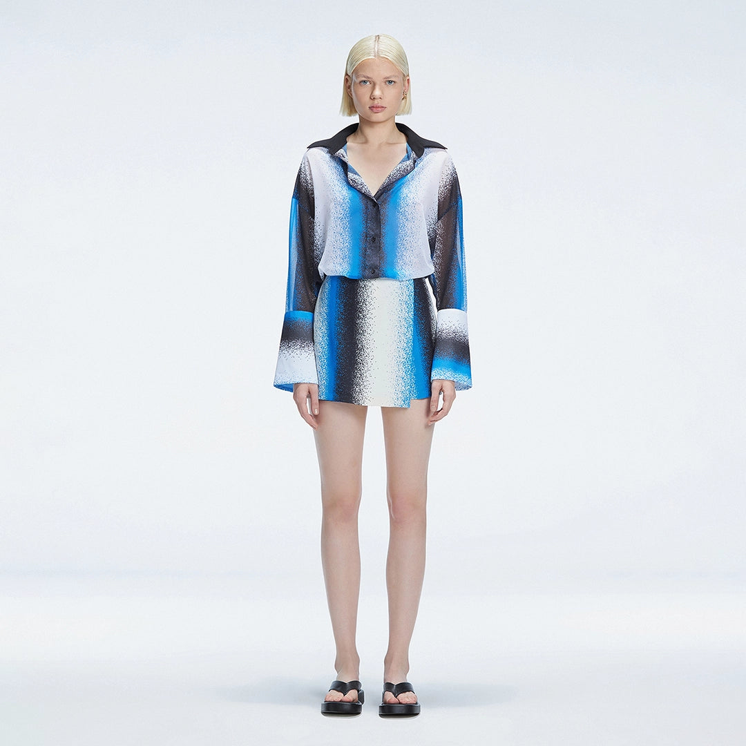 Janine Long-Sleeve Shirt and Gillian Mini Skort Blue Degraded Set | Moeva | | Each week unveils new pieces—luxury swimwear, fluid resort silhouettes, and elevated summer-to-evening essentials designed to carry you from coastal escapes to city nights.