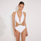 Jolanda White Halter Monokini | Moeva | Swimsuit | Each week unveils new pieces—luxury swimwear, fluid resort silhouettes, and elevated summer-to-evening essentials designed to carry you from coastal escapes to city nights.