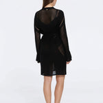 Kenga Knitted Knee-Length Long-Sleeve Belted Black Kaftan | Moeva | Kaftans | Each week unveils new pieces—luxury swimwear, fluid resort silhouettes, and elevated summer-to-evening essentials designed to carry you from coastal escapes to city nights.