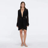 Kenga Knitted Knee-Length Long-Sleeve Belted Black Kaftan | Moeva | Kaftans | Each week unveils new pieces—luxury swimwear, fluid resort silhouettes, and elevated summer-to-evening essentials designed to carry you from coastal escapes to city nights.