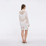 Kenga Knitted Knee-Length Long-Sleeve Belted White Kaftan | Moeva | Kaftans | Each week unveils new pieces—luxury swimwear, fluid resort silhouettes, and elevated summer-to-evening essentials designed to carry you from coastal escapes to city nights.