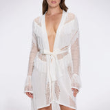 Kenga Knitted Knee-Length Long-Sleeve Belted White Kaftan | Moeva | Kaftans | Each week unveils new pieces—luxury swimwear, fluid resort silhouettes, and elevated summer-to-evening essentials designed to carry you from coastal escapes to city nights.