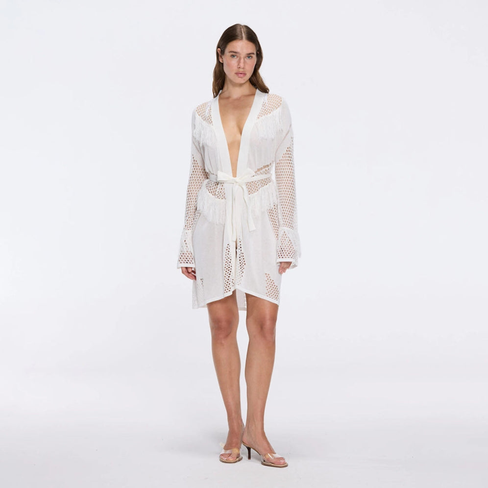 Kenga Knitted Knee-Length Long-Sleeve Belted White Kaftan | Moeva | Kaftans | Each week unveils new pieces—luxury swimwear, fluid resort silhouettes, and elevated summer-to-evening essentials designed to carry you from coastal escapes to city nights.