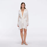 Kenga Knitted Knee-Length Long-Sleeve Belted White Kaftan | Moeva | Kaftans | Each week unveils new pieces—luxury swimwear, fluid resort silhouettes, and elevated summer-to-evening essentials designed to carry you from coastal escapes to city nights.