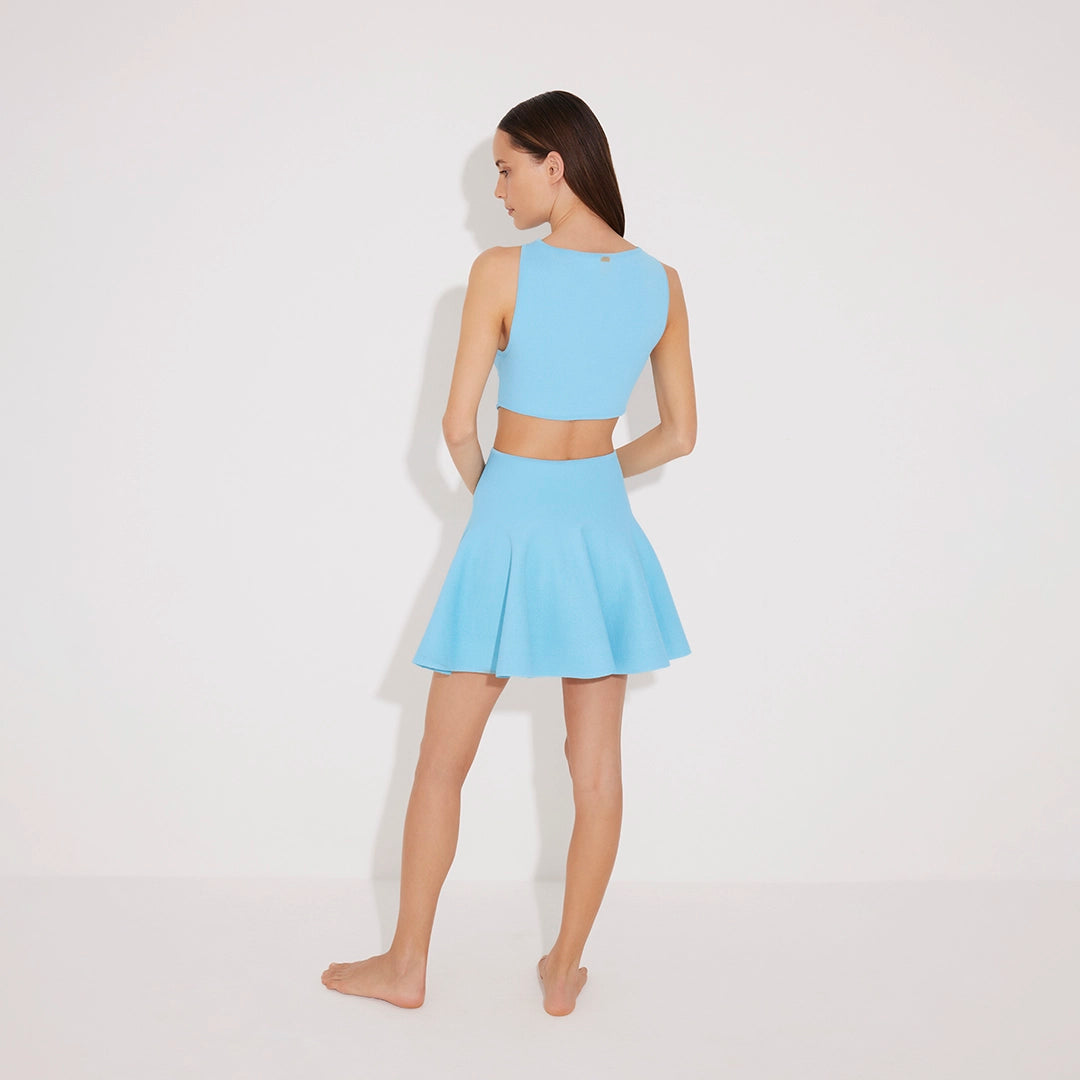Lanao Blue Cut-Out Knit Mini Dress with Gold Detail | Moeva | RTW Dresses | Each week unveils new pieces—luxury swimwear, fluid resort silhouettes, and elevated summer-to-evening essentials designed to carry you from coastal escapes to city nights.