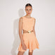 Lanao Orange Cut-Out Knit Mini Dress with Gold Detail | Moeva | RTW Dresses | Each week unveils new pieces—luxury swimwear, fluid resort silhouettes, and elevated summer-to-evening essentials designed to carry you from coastal escapes to city nights.