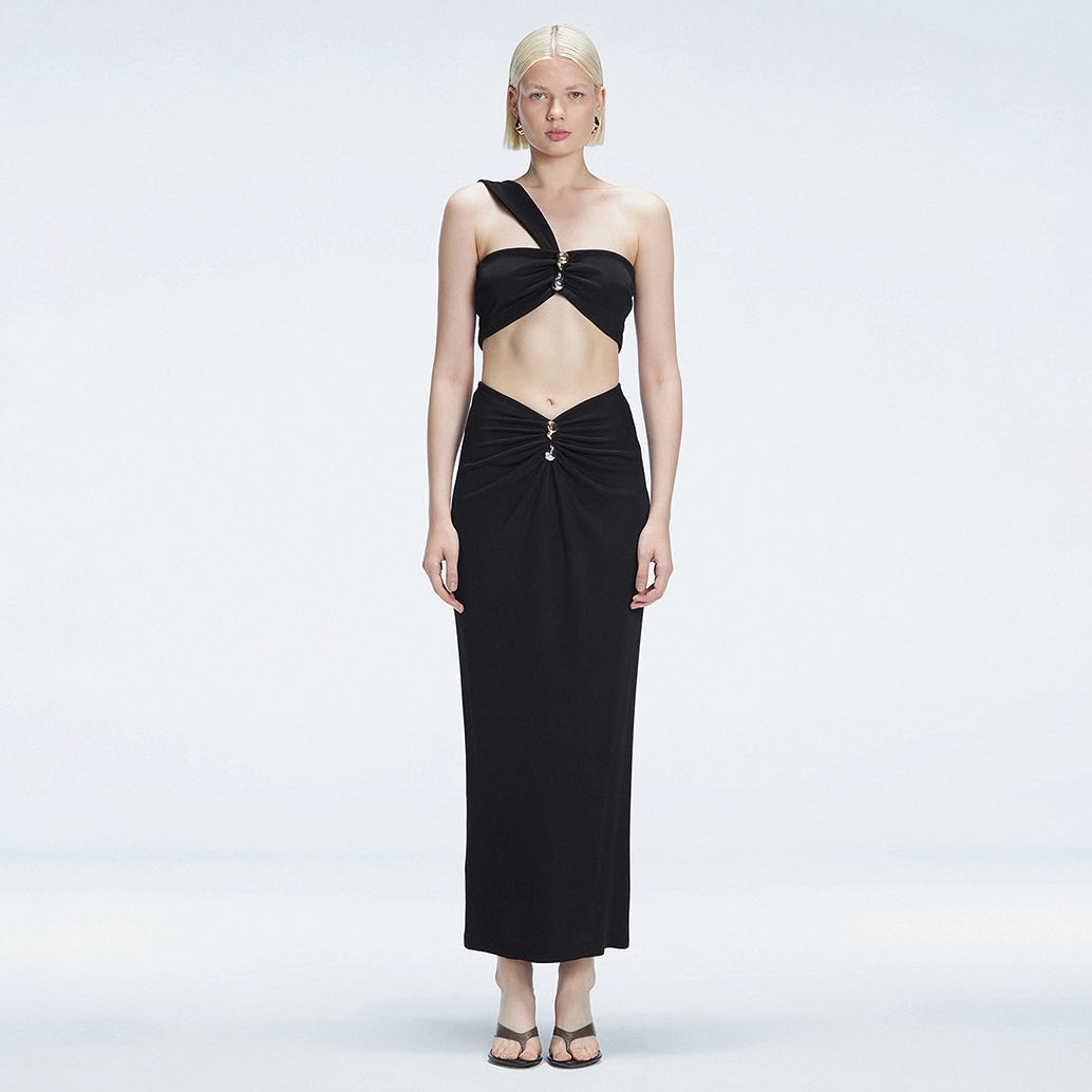 Lane One-Shoulder Black Crop Top and Esmeralda Maxi Skirt with Front Ruched Detail | Moeva | Set | Each week unveils new pieces—luxury swimwear, fluid resort silhouettes, and elevated summer-to-evening essentials designed to carry you from coastal escapes to city nights.