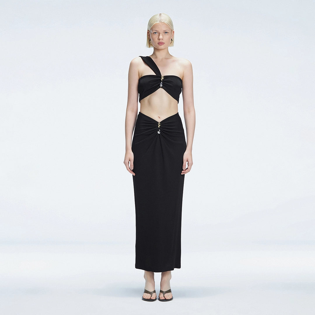 Lane One-Shoulder Black Crop Top and Esmeralda Maxi Skirt with Front Ruched Detail | Moeva | | Each week unveils new pieces—luxury swimwear, fluid resort silhouettes, and elevated summer-to-evening essentials designed to carry you from coastal escapes to city nights.
