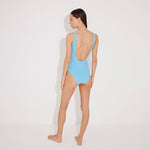 Lelia Blue Swimsuit | Moeva | Swimsuit | Each week unveils new pieces—luxury swimwear, fluid resort silhouettes, and elevated summer-to-evening essentials designed to carry you from coastal escapes to city nights.