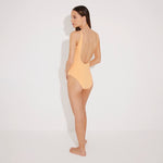 Lelia Orange/Lilac Swimsuit | Moeva | Swimsuit | Each week unveils new pieces—luxury swimwear, fluid resort silhouettes, and elevated summer-to-evening essentials designed to carry you from coastal escapes to city nights.
