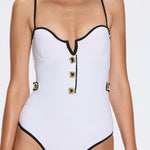 Lourmarin White Underwired Gold Button Detail Swimsuit | Moeva | Swimsuit | Each week unveils new pieces—luxury swimwear, fluid resort silhouettes, and elevated summer-to-evening essentials designed to carry you from coastal escapes to city nights.