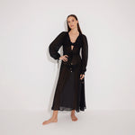 Lula Silk Blouson-Sleeve Belted Sheer Black Maxi Dress | Moeva | Beachwear Dresses | Each week unveils new pieces—luxury swimwear, fluid resort silhouettes, and elevated summer-to-evening essentials designed to carry you from coastal escapes to city nights.
