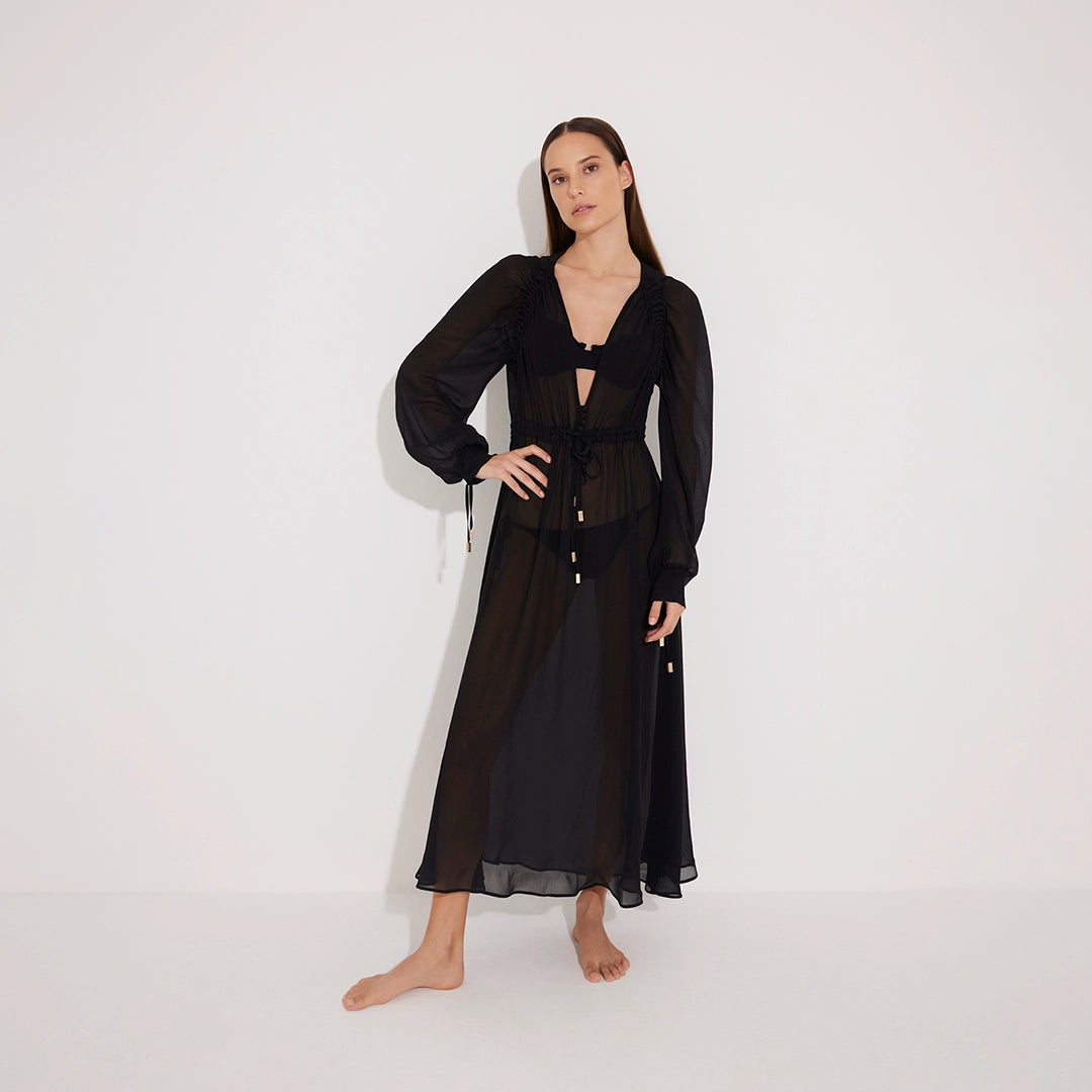 Lula Silk Blouson-Sleeve Belted Sheer Black Maxi Dress | Moeva | Beachwear Dresses | Each week unveils new pieces—luxury swimwear, fluid resort silhouettes, and elevated summer-to-evening essentials designed to carry you from coastal escapes to city nights.