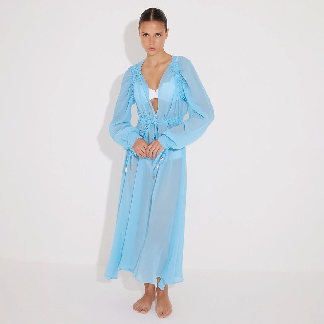 Lula Silk Blouson-Sleeve Belted Sheer Blue Maxi Dress | Moeva | Dress | Each week unveils new pieces—luxury swimwear, fluid resort silhouettes, and elevated summer-to-evening essentials designed to carry you from coastal escapes to city nights.