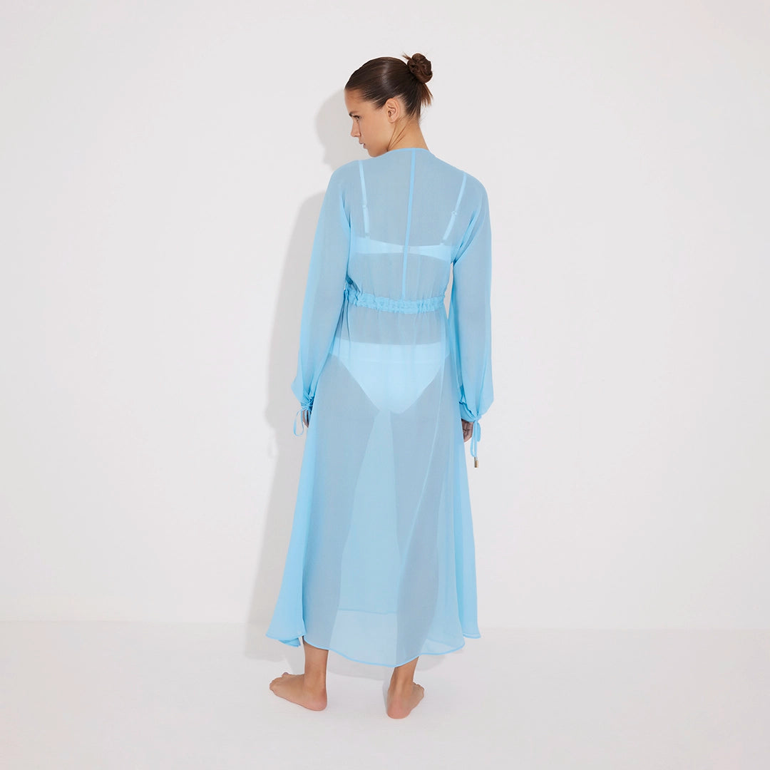 Lula Silk Blouson-Sleeve Belted Sheer Blue Maxi Dress | Moeva | Beachwear Dresses | Each week unveils new pieces—luxury swimwear, fluid resort silhouettes, and elevated summer-to-evening essentials designed to carry you from coastal escapes to city nights.