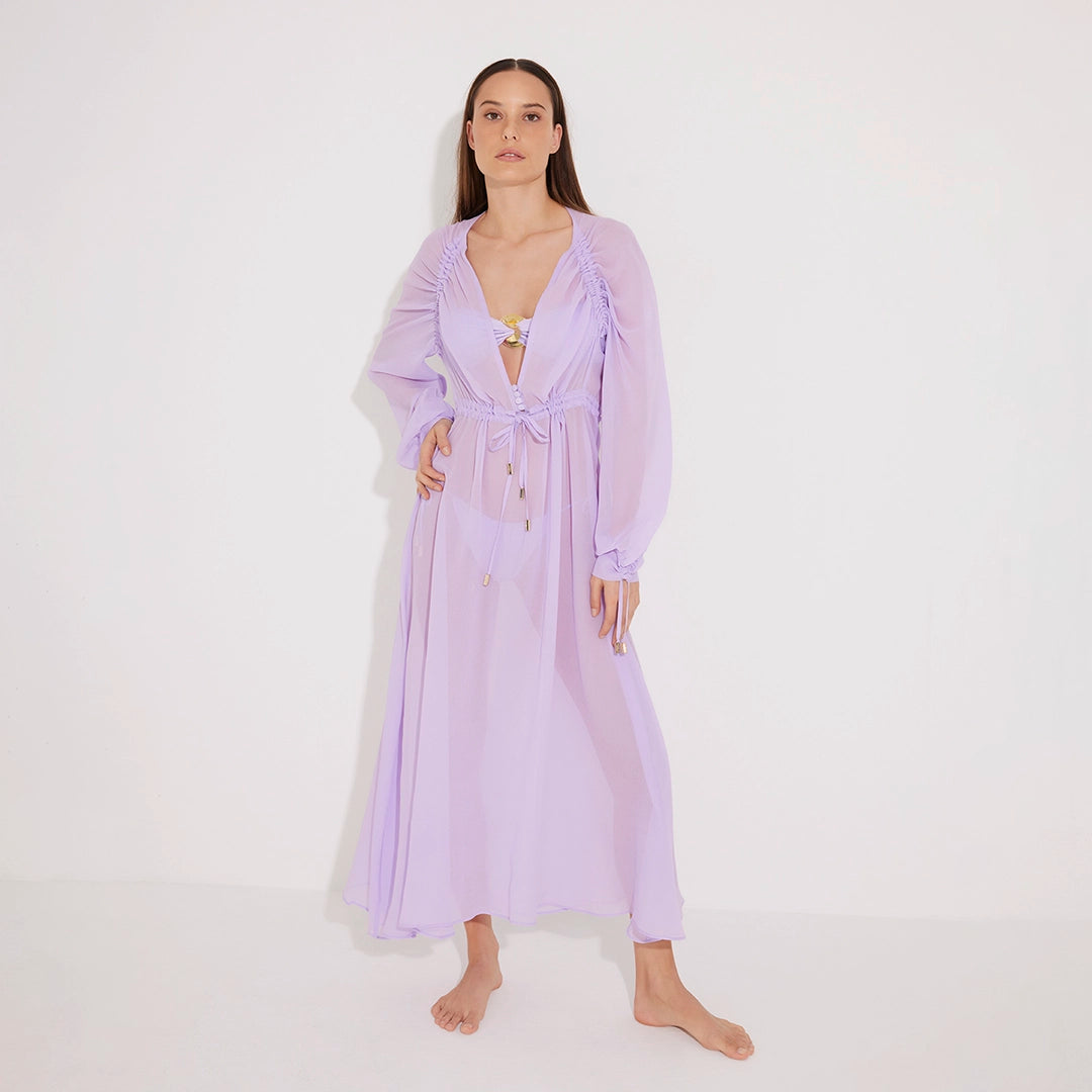 Lula Silk Blouson-Sleeve Belted Sheer Lilac Maxi Dress | Moeva | Beachwear Dresses | Each week unveils new pieces—luxury swimwear, fluid resort silhouettes, and elevated summer-to-evening essentials designed to carry you from coastal escapes to city nights.