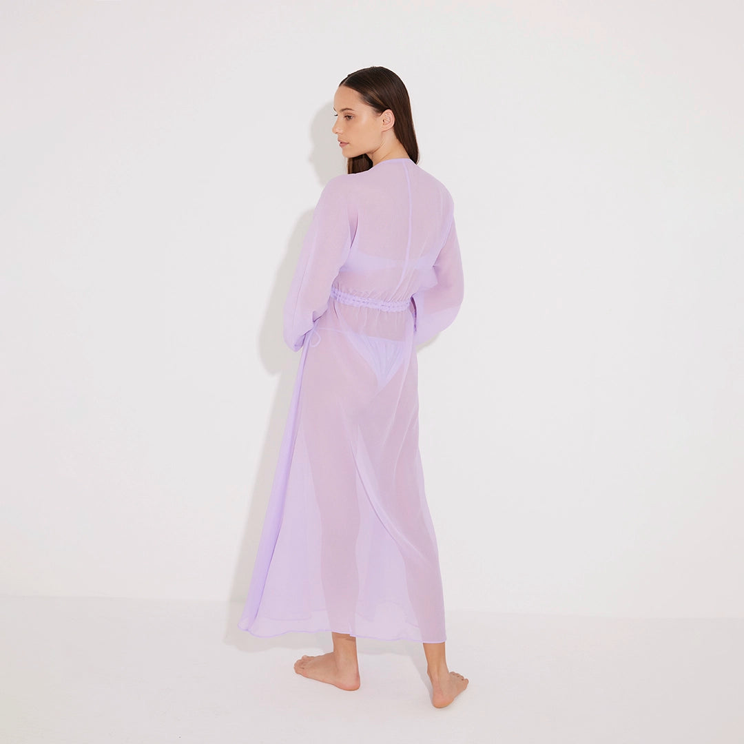 Lula Silk Blouson-Sleeve Belted Sheer Lilac Maxi Dress | Moeva | Beachwear Dresses | Each week unveils new pieces—luxury swimwear, fluid resort silhouettes, and elevated summer-to-evening essentials designed to carry you from coastal escapes to city nights.