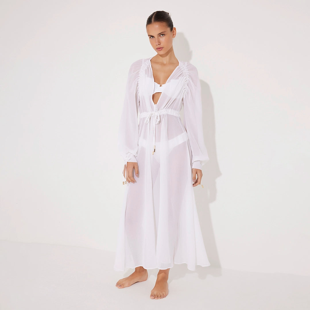 Lula Silk Blouson-Sleeve Belted Sheer White Maxi Dress | Moeva | Beachwear Dresses | Each week unveils new pieces—luxury swimwear, fluid resort silhouettes, and elevated summer-to-evening essentials designed to carry you from coastal escapes to city nights.