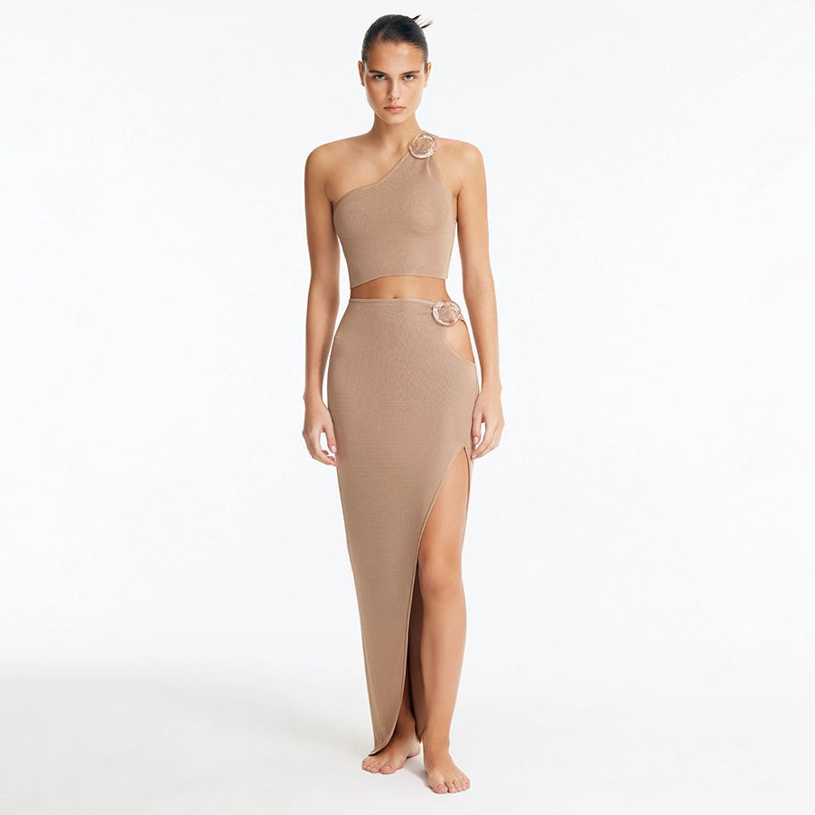 Eila Bronze One Shoulder Knitted Crop Top and Lyndon Bronze Knitted Skirt with Side Slit | Moeva | Set | Each week unveils new pieces—luxury swimwear, fluid resort silhouettes, and elevated summer-to-evening essentials designed to carry you from coastal escapes to city nights.