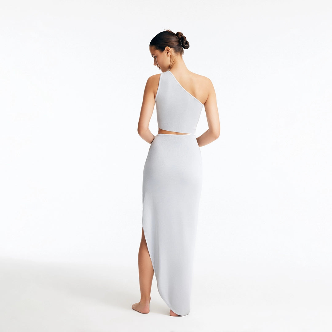 Lyndon Silver Knitted Skirt with Side Slit | Moeva | Skirt | Each week unveils new pieces—luxury swimwear, fluid resort silhouettes, and elevated summer-to-evening essentials designed to carry you from coastal escapes to city nights.
