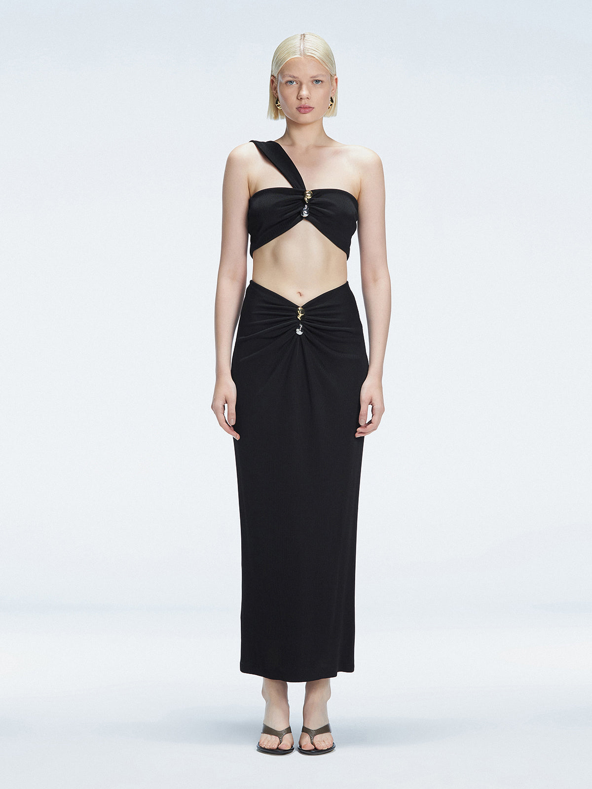 Front view of model wearing Lane Black One-Shoulder Top with ruched detail at the front.
