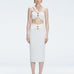 Front view of model wearing 
 Lane Top and Esmeralda White Midi Skirt with ruched and buckle detailing.
