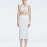 Front view of model wearing 
 Lane Top and Esmeralda White Midi Skirt with ruched and buckle detailing.
