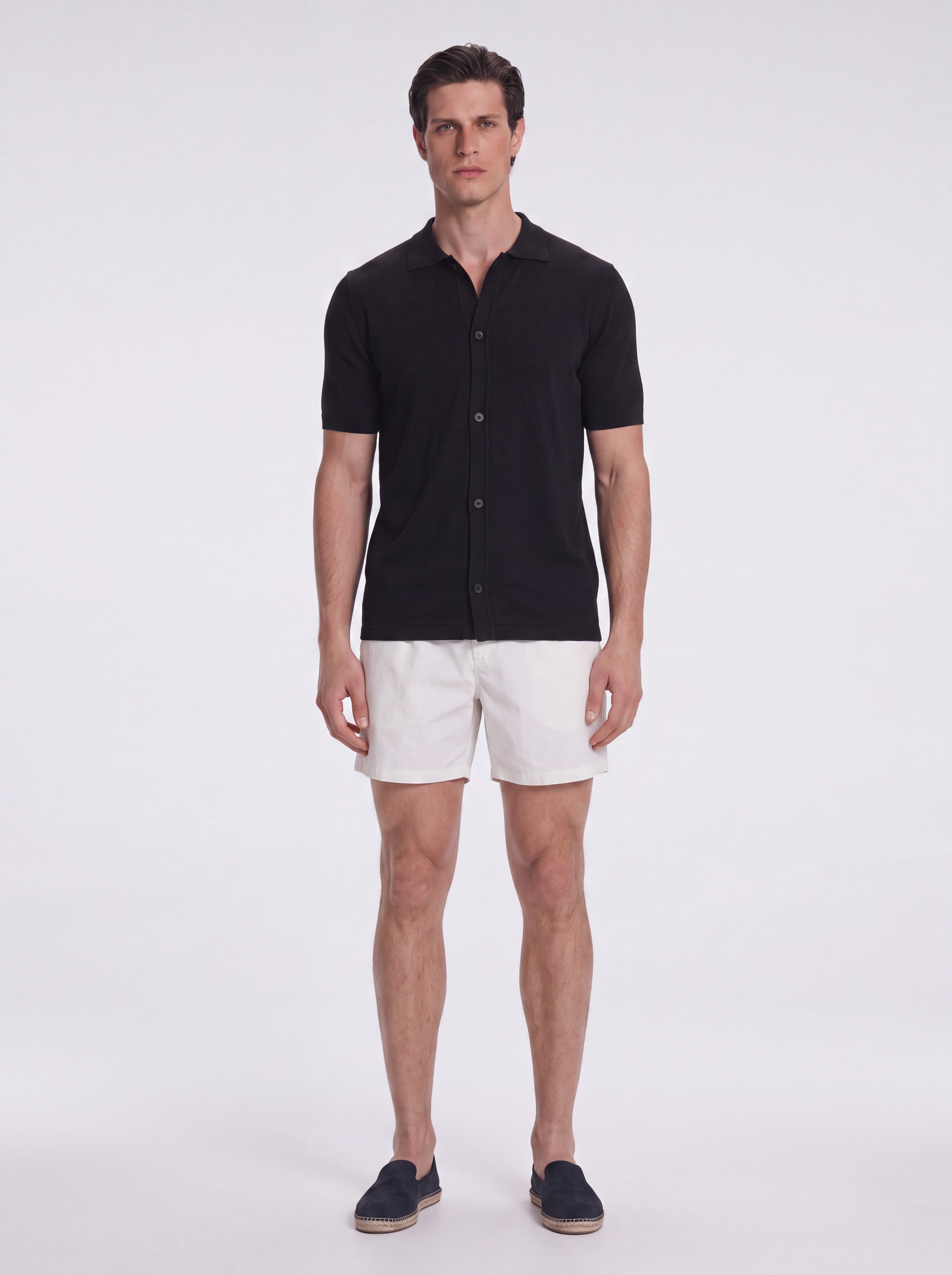 Lars Black Polo Shirt with Button Fastening | Moeva | T-Shirt | Each week unveils new pieces—luxury swimwear, fluid resort silhouettes, and elevated summer-to-evening essentials designed to carry you from coastal escapes to city nights.