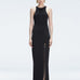 Front view of model wearing Louisa Black Maxi Dress with high neck, sleeveless design, and buckle detail.
