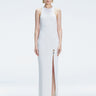 Front view of model wearing Louisa White Maxi Dress with high neck, sleeveless design, and buckle detail.
