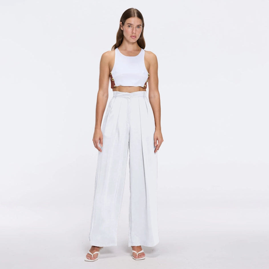 Manami White High Waist Wide Leg Pants | Moeva | Women RTW Pants | Each week unveils new pieces—luxury swimwear, fluid resort silhouettes, and elevated summer-to-evening essentials designed to carry you from coastal escapes to city nights.