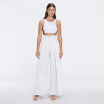 Manami White High Waist Wide Leg Pants | Moeva | Women RTW Pants | Each week unveils new pieces—luxury swimwear, fluid resort silhouettes, and elevated summer-to-evening essentials designed to carry you from coastal escapes to city nights.