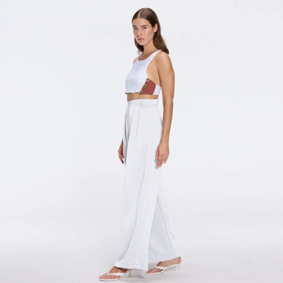 Manami White High Waist Wide Leg Pants | Moeva | Women RTW Pants | Each week unveils new pieces—luxury swimwear, fluid resort silhouettes, and elevated summer-to-evening essentials designed to carry you from coastal escapes to city nights.