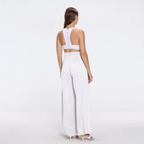 Manami White High Waist Wide Leg Pants | Moeva | Women RTW Pants | Each week unveils new pieces—luxury swimwear, fluid resort silhouettes, and elevated summer-to-evening essentials designed to carry you from coastal escapes to city nights.