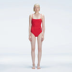 Marigold Red Corset Square Neck Swimsuit | Moeva | One-Piece | Each week unveils new pieces—luxury swimwear, fluid resort silhouettes, and elevated summer-to-evening essentials designed to carry you from coastal escapes to city nights.